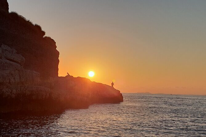 2-Hour Sorrento Coast Sunset Cruise with Dinner Experience - Puolo Bay and Cascatella di Punta Lagno: fishermen life meets waterfall drama