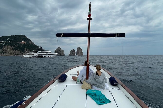 3 hour private boat tour on the island of Capri - Natural Arch, Faraglioni Photos, and Villa Malaparte From the Sea