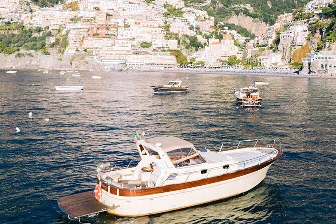 Amalfi Coast Private Boat Tour From Praiano or Positano - Positano Stop: A Short Dock Look and the €8 Fee Question