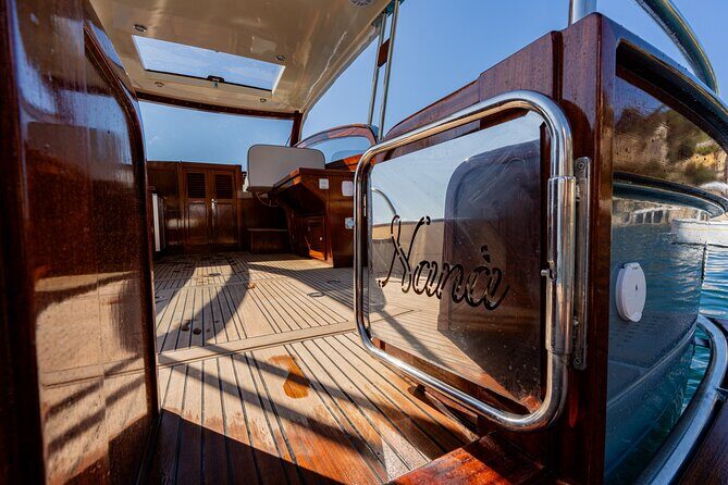 Amalfi Coast Semi Private Boat Day Trip from Sorrento - On-board comfort: skipper, snacks, Prosecco, and pacing