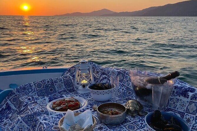 Aperitif on a boat at sunset in Palinuro - Why a sunset boat aperitif works in Palinuro