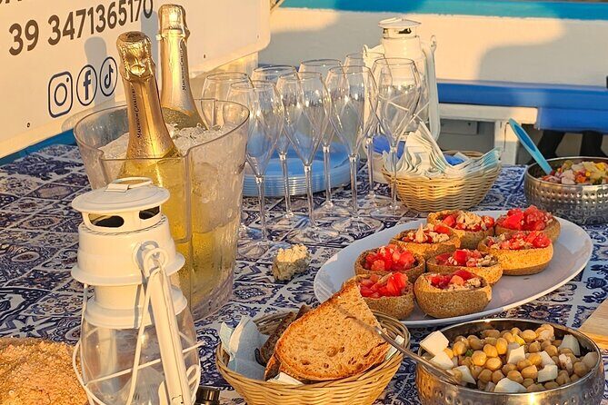 Aperitif on a boat at sunset in Palinuro - Guides, group size, and the feel on board
