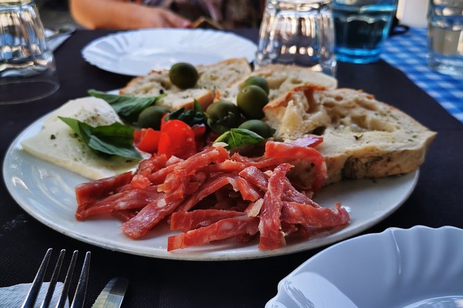 Authentic Pizza Making Class in Naples with Appetizers and Drink - Stretching and topping: Margherita or Marinara choice