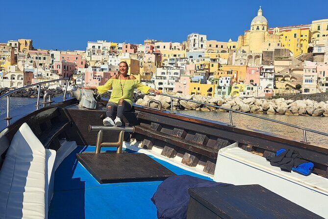 Boat tour with lunch on board to discover Procida - Lacco Ameno and Baia di San Montano: the first swim, bruschetta, and the coast view that helps everything click