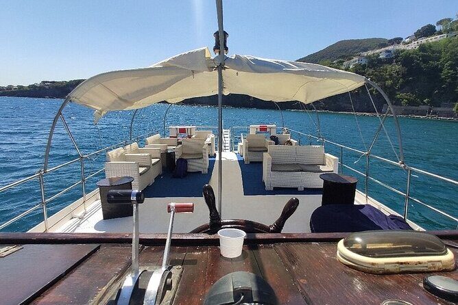 Boat tour with lunch on board to discover Procida - Spiaggia degli Inglesi: the WWII story and the pebbly beach you reach by boat