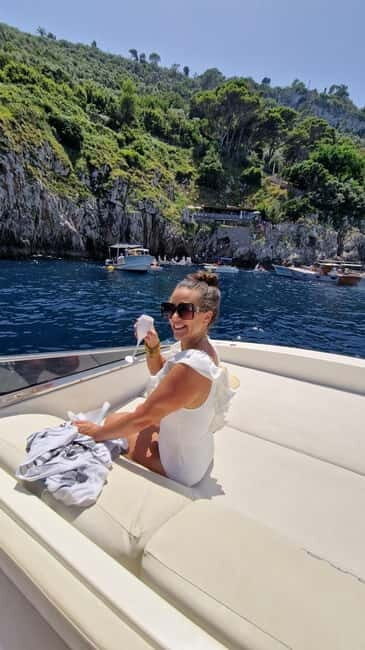 Capri : 2 Hours Private Boat from Capri - Faraglioni and Tiberio’s Jump: History on a Fast Photo Loop