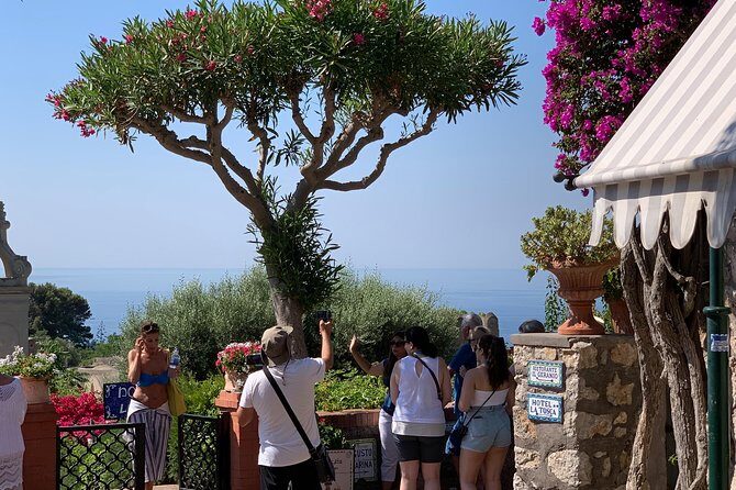 Capri & Anacapri Day Tour with Blue Grotto included from Sorrento - Capri town highlights: Faraglioni photos, Via Camerelle, and Piazzetta