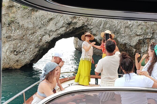 Capri and Blue Grotto Small Group Boat Tour - Punta Carena Lighthouse: Quick Stop, Best Sunset Energy