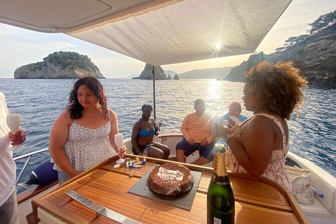 Capri and Blue Grotto Small Group Boat Tour - Punta Ventroso Break: Music, Aperitif, and a Relaxing Float