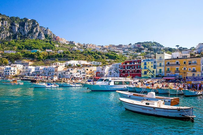 Capri and Positano Private Boat Excursion - Faraglioni from the water: close-up cliffs and the hole in the rock