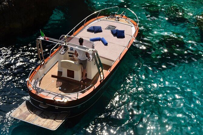 Capri boat excursion - I Faraglioni: the signature rock stacks and a photo pass under the arch