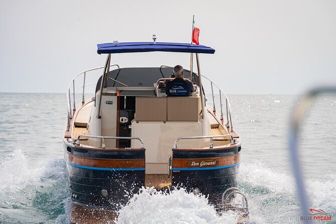 Capri Boat Tour for Small Groups - Passage under the Capri sea stacks: Prosecco and the photo moment