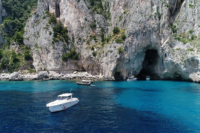 Capri Boat Tour from Sorrento - Speedboat 37ft - Faraglioni: making a wish under the natural arch