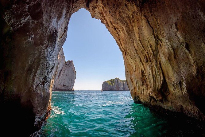 Capri Boat Tour from Sorrento: Swim, Grottos & Light Lunch - Faraglioni, Villa Malaparte, and Punta Carena: postcard scenes from the water