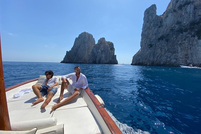 Capri Boat Tour: Grottoes, Swim & Sip Limoncello in a Small Group - Punta Carena and the Faraglioni: the big-name sights in one run