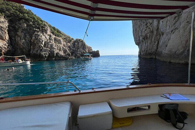 Capri by Boat private Comfortable tour - The lighthouse stop: small, pretty, and good for photos