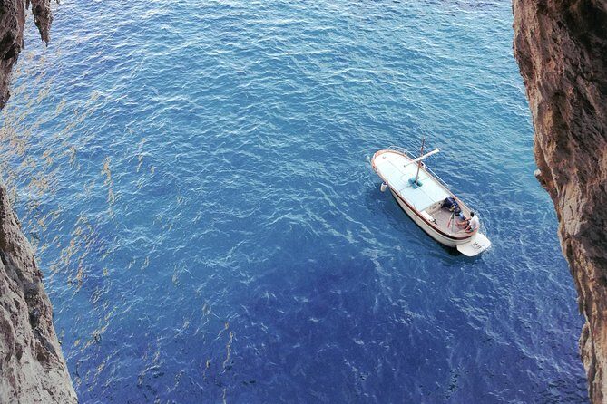 Capri by Boat private Comfortable tour - Green Grotto time: swims, cliff views, and snorkel-ready gear