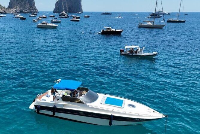 Capri by Boat: Private Tour of the Blue Grotto and Faraglioni - White Grotta and Faraglioni: limestone caves plus the iconic rock arch