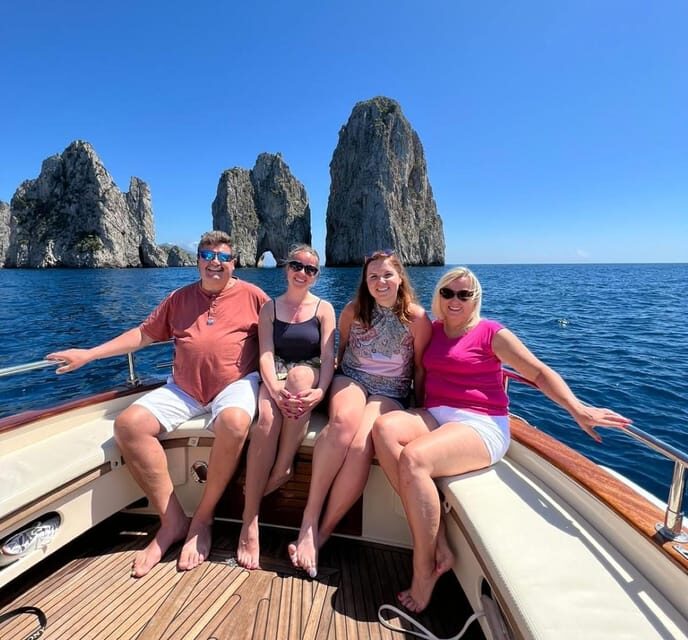 Capri: Exclusive Boat Tour of Hidden Gems with Swimming - Faraglioni photo time: iconic rocks, better angles from the boat