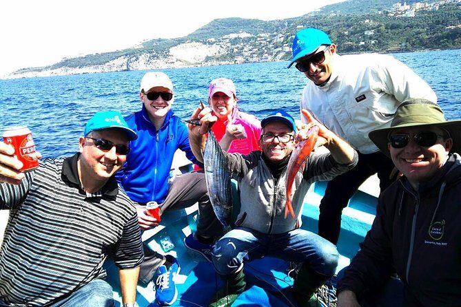 Capri Fishing Excursion with Snorkeling and Lunch from Sorrento - Cruising Capri’s coast with a local skipper at the wheel