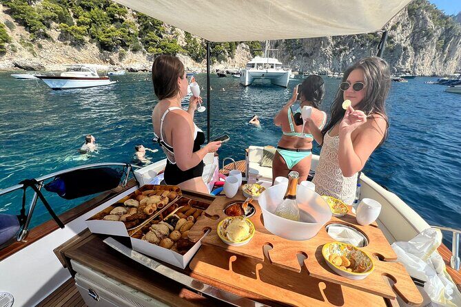 Capri Premium Boat Tour and City Visit Free Bar and Aperitif - Cala del Rio and Grotta Iannarella: the Heart Cave moment