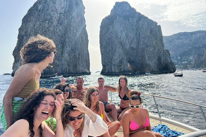 Capri Premium Private Boat Tour + City Visit - Faraglioni, Mermaids Rock, and Villa Malaparte views