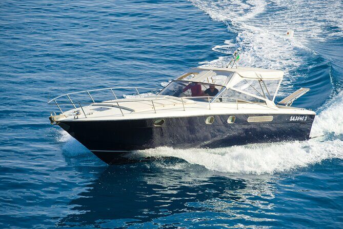 Capri Private Boat Excursion with Faraglioni and Blue Grotto - White Grotto and the Natural Arch: Two Quick Stops, Big Visual Payoff