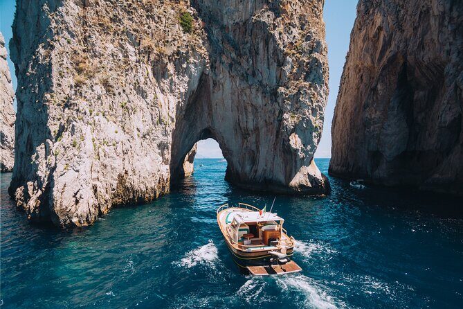Capri Private Boat Tour from Sorrento, Positano or Naples - Gozzo F.lli Aprea 36 - The lighthouse stop and the built-in snack-and-sip breaks