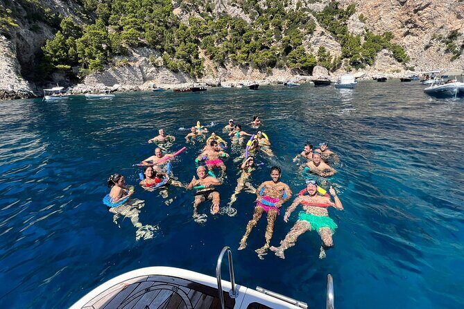 Capri Secret Corners Semi-Private Boat Tour with Local Captain - Onboard setup: music, Wi‑Fi, drinks, and a real restroom