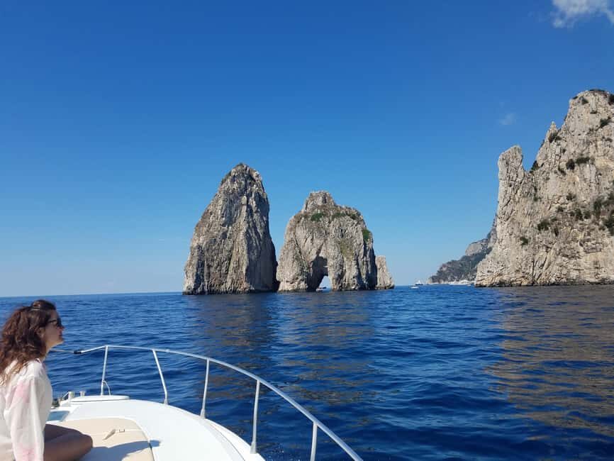 Capri: shared boat tour from Sorrento - 7 hours - Circling Capri by boat: Tiberius, the White Cave, arches, and Faraglioni