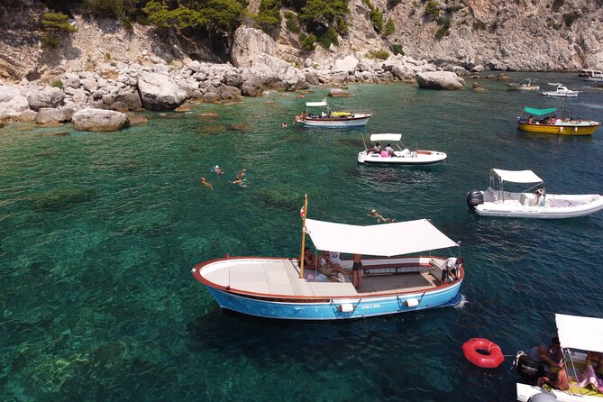 Capri tour with "Gozzo" (3 hours) - The Cave Stops: Green, Saints, Lighthouse, Heart, White, and Coral