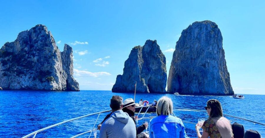 Discover Capri's Hidden Gems: Group Tour Boat Experience - Stop 1–3: cruising Capri’s coast, Faraglioni included