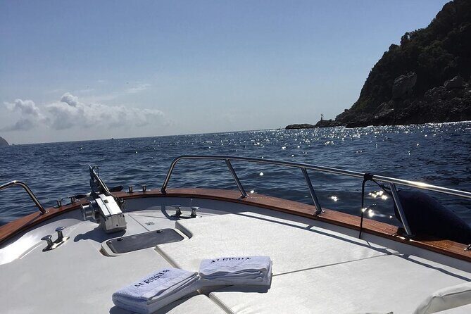 Exclusive Boat Tour to Capri with Swim Stop and Aperitif - Cruising Capri east to west: the landmarks you’ll actually spot