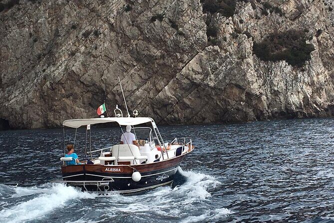 Exclusive Boat Tour to Capri with Swim Stop and Aperitif - Stop 1: I Faraglioni swim stop—where the photos come from