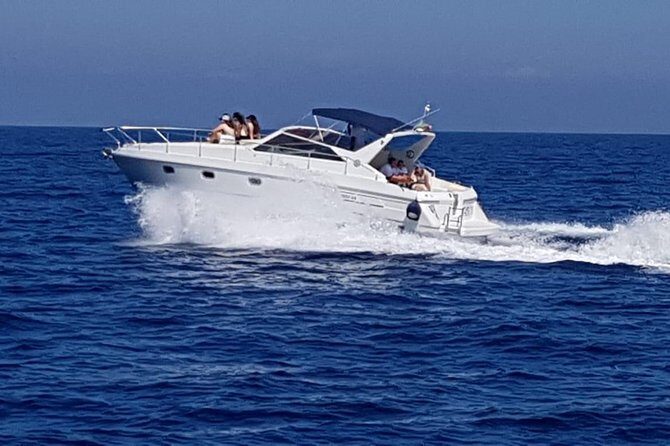 Excursion to Capri by shared boat departure from Sorrento - The return ride: Faraglioni and the cave stops on the way back