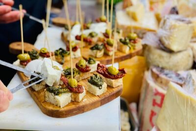 Flavors of Naples Decumani Street Food and Sightseeing Tour - Start at Piazza Bellini: the student energy and the Greek Walls feel