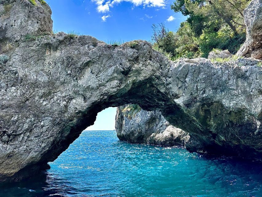 From Amalfi: 7H Amalfi Coast - Group Tour by boat - Conca dei Marini, the Natural Arch, and Waterfall Photos