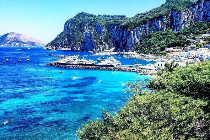 From Naples: Guided Capri Tour with Blue Grotto Included - Capri town walking tour and the short-stop reality