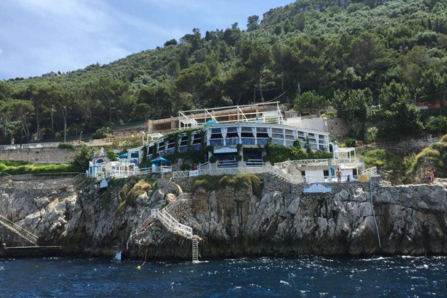 From Naples: Private Capri Boat Excursion - Crossing the Bay of Naples: Sorrento on one side, Vesuvius on the other