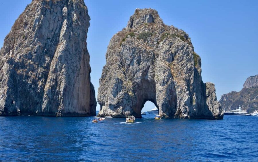 From Positano: Day trip to Capri - Group Tour by boat - Capri’s highlights from the boat: Faraglioni and grotto viewpoints