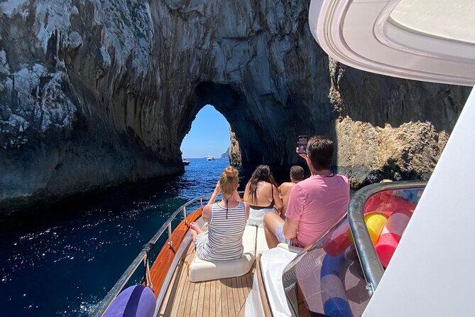 From Positano : Elite Capri Boat Day Free Bar, Brunch & City Walk - Roman touchpoints you’ll pass: Bagni di Tiberio, Villa Jovis and Mermaid’s Rock