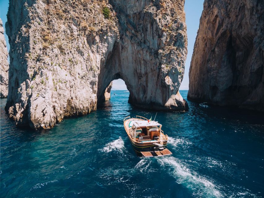 From Sorrento: Capri and Blue Grotto Half-Day Boat Tour - Capri by boat: the cave route and how it works in real time