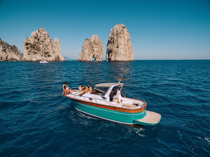 From Sorrento: Capri and Blue Grotto Half-Day Boat Tour - On-board snacks, drinks, and limoncello: a small touch that helps