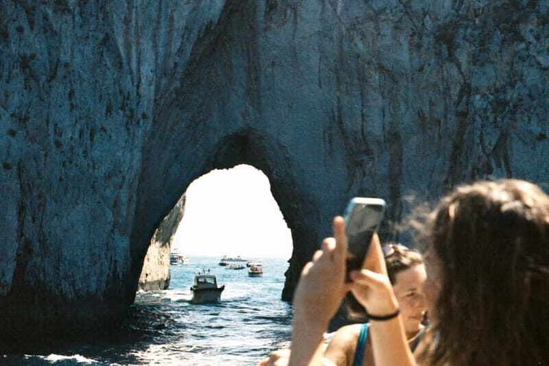 From Sorrento: Capri Boat Cruise with Swimming and Prosecco - The onboard experience: drinks, skipper-guides, and a max-12 group