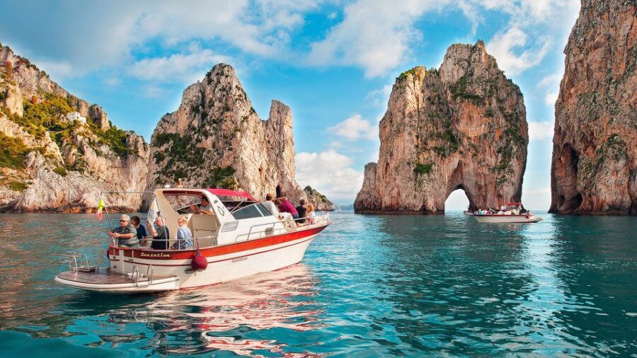 From Sorrento: Capri Island Small Group Boat Excursion - The Capri boat loop: Faraglioni, arches, and cave views