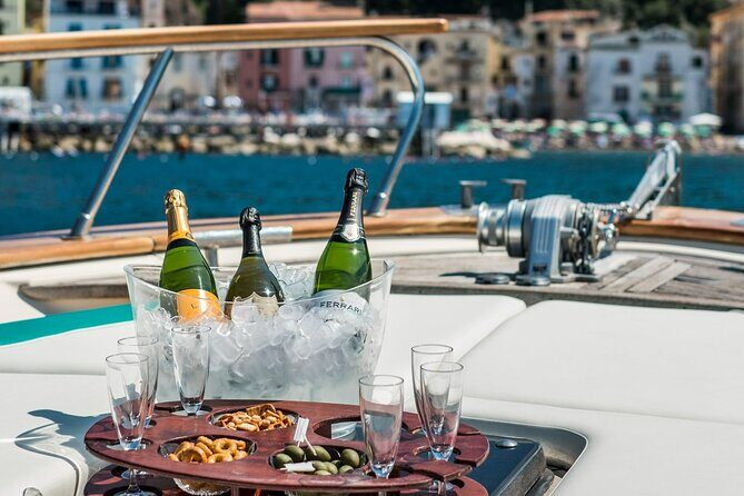 Full-Day Amalfi Coast Private Boat Tour from Sorrento or Positano - Positano for Two Hours: Chic Shops, Beach Views, and a Reality Check