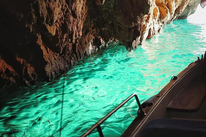 Full day on a private boat to discover Capri - Cave circuit: Green Grotto, White Grotto, Natural Arch, and Coral Cave