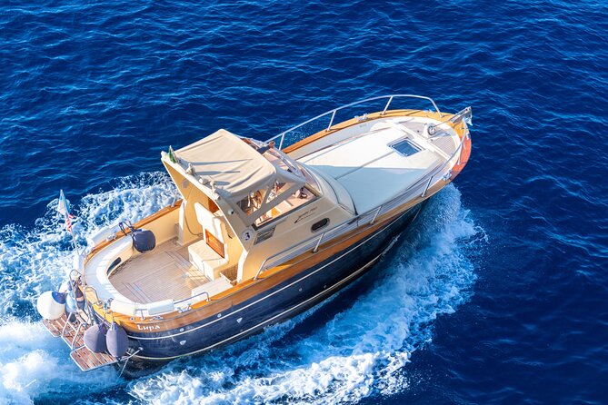 Full Day Private Amalfi Coast Cruise from Positano or Praiano - Onboard perks: snacks, Prosecco, and limoncello