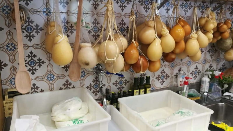 Guided Walking Tour of Sorrento with Limoncello Tasting - The scheduled tasting break: wine, cheese, and food