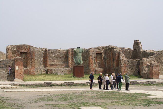 Half-Day Exclusive Private Tour of Pompeii and Herculaneum - The Pompeii Experience: Forum Life, Shops, Sewers, and the City Layout